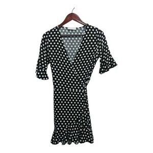 Adorable black polka dot dress by Elodie. Size small